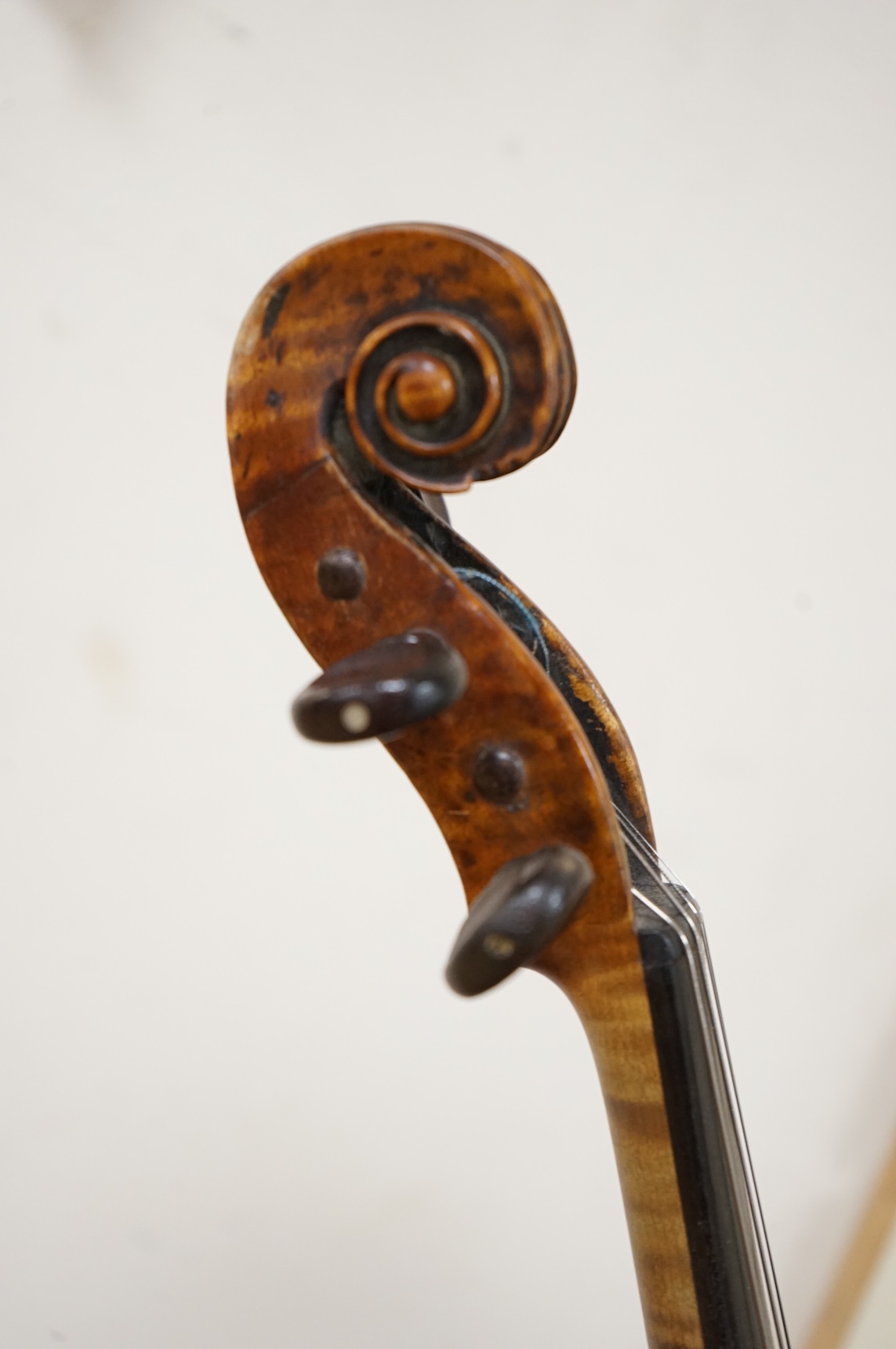 An interesting late 18th century violin, with one piece bird’s eye maple back, unsigned, with two silver fully mounted octagonal bows, one stamped Voight CITES Submission reference, 3XFNUBT7 and Submission reference, RHL